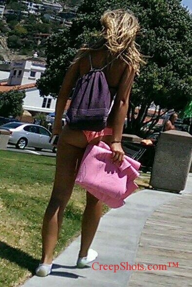 Candid beach creepshot of blonde wearing a thong