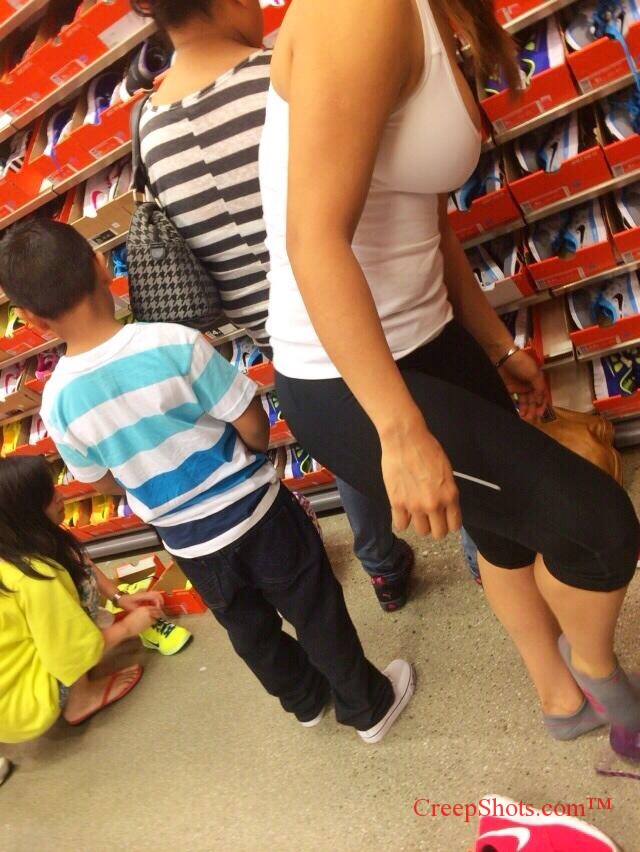 side boob creepshot of a sexy shoe shopper