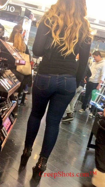 blonde shopping creep shot in tight jeans