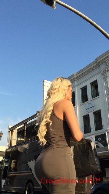 candid ass creep of a pawg in a tight brown dress