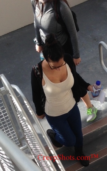 big boobs walking down the stairs