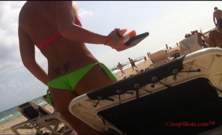 tanned booty at the beach