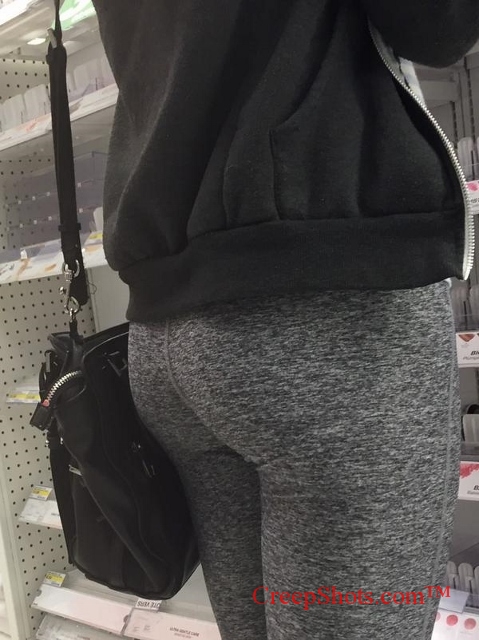a plump ass in grey yoga pants