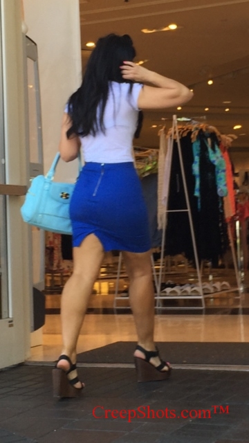 thick ass and legs in a tight blue skirt