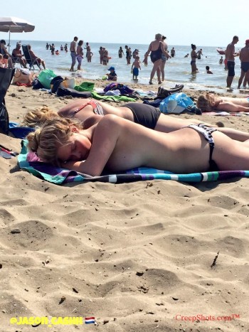 topless woman on beach