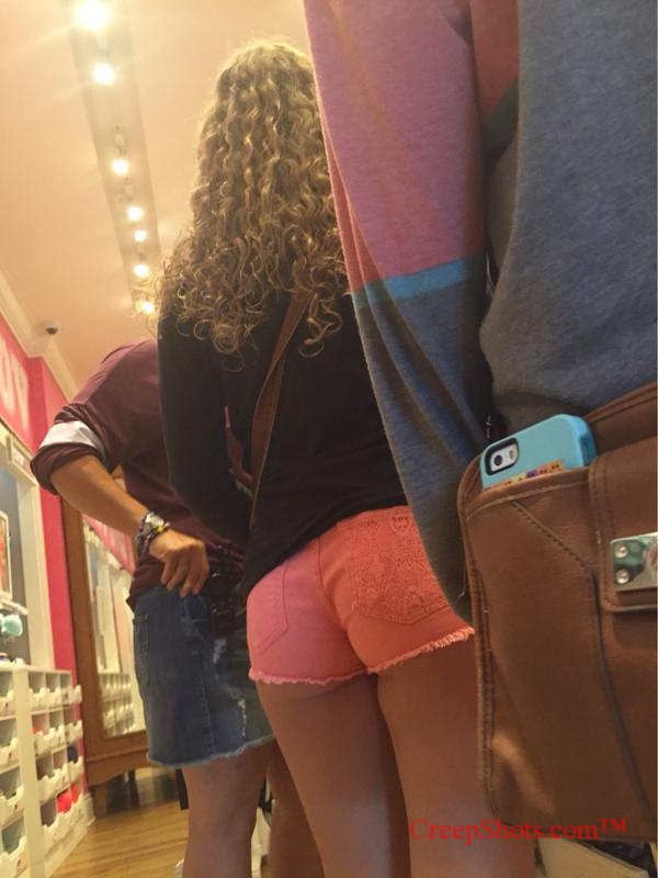 candid peach booty shopping