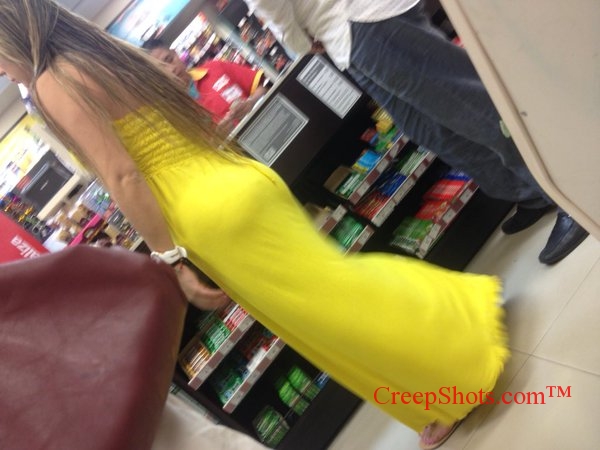 sexy girl in a yellow dress